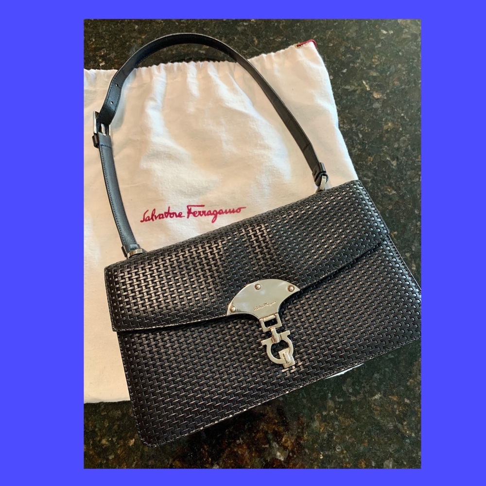 Salvatore Ferragamo Black clutch/ hang bag